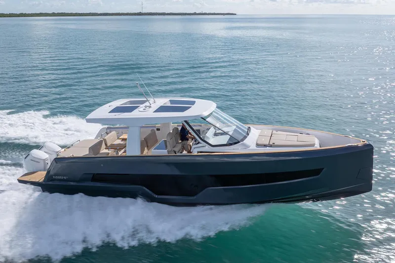 Slide: The Image of 2026 Fjord 41 XP yacht cruising on open water, showcasing sleek design and luxury features. - 6