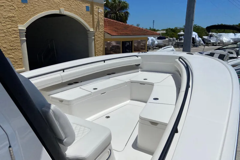 Slide: The Image of 2026 Regulator 28 boat with spacious seating and sleek design. - 19