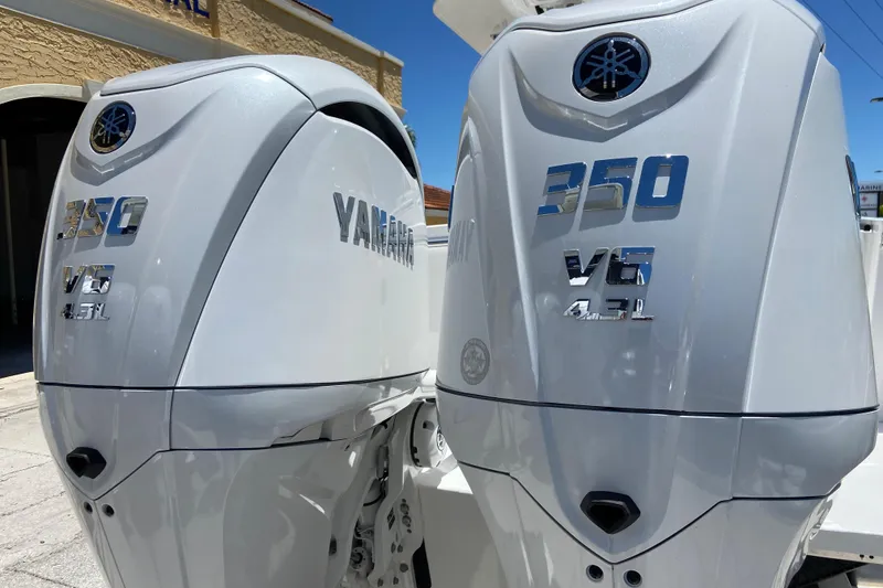 Slide: The Image of Twin Yamaha 350 V6 outboard engines on a 2026 Regulator 28 boat. - 2