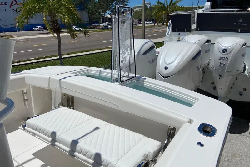 Slide: The Image of 2026 Regulator 28 boat with Yamaha outboard engines, featuring a sleek white design. - 4
