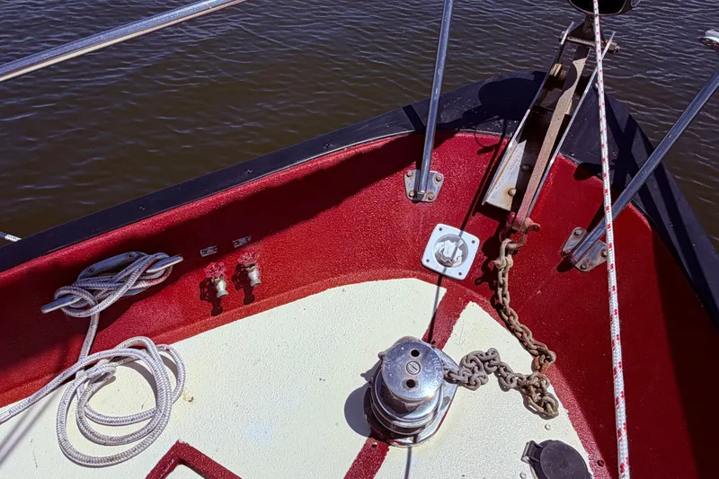 Slide: The Image of Deck of 1985 Lancer Yachts 40 Motorsailer with ropes and anchor chain. - 11
