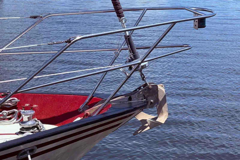 Slide: The Image of Bow of 1985 Lancer Yachts 40 Motorsailer with anchor over calm water. - 15