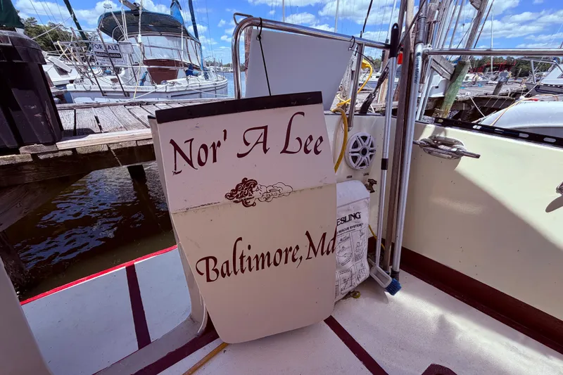 Slide: The Image of 1985 Lancer Yachts 40 Motorsailer docked, featuring "Nor' A Lee" from Baltimore, MD. - 17