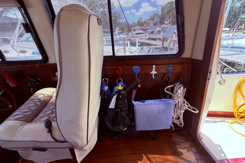Slide: The Image of Interior of 1985 Lancer Yachts 40 Motorsailer with seat and nautical equipment. - 25
