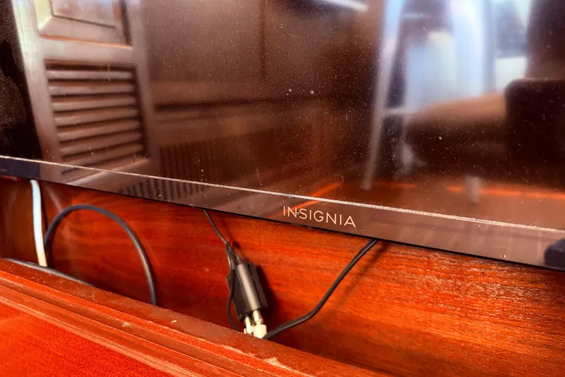 Slide: The Image of Insignia TV on 1985 Lancer Yachts 40 Motorsailer with wooden interior. - 45