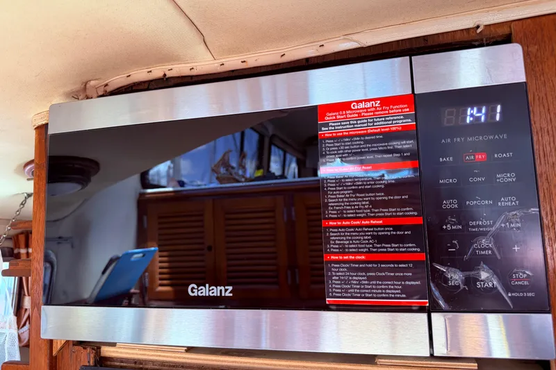 Slide: The Image of Galanz microwave inside 1985 Lancer Yachts 40 Motorsailer, featuring air fry and convection options. - 51
