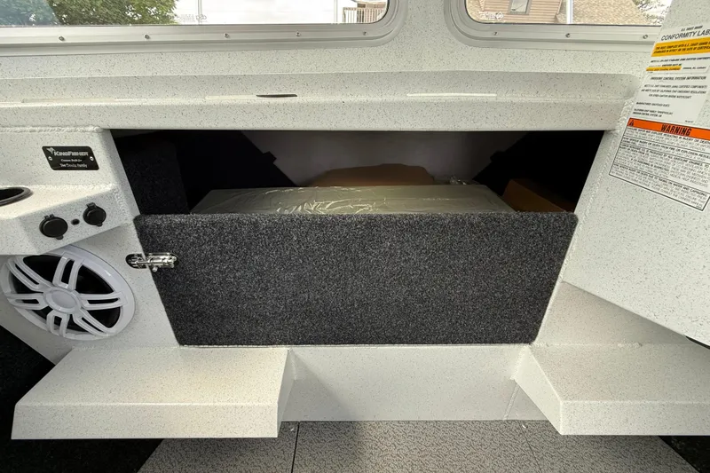 Slide: The Image of Interior storage compartment of 2026 KingFisher 2825 Coastal Express boat. - 19