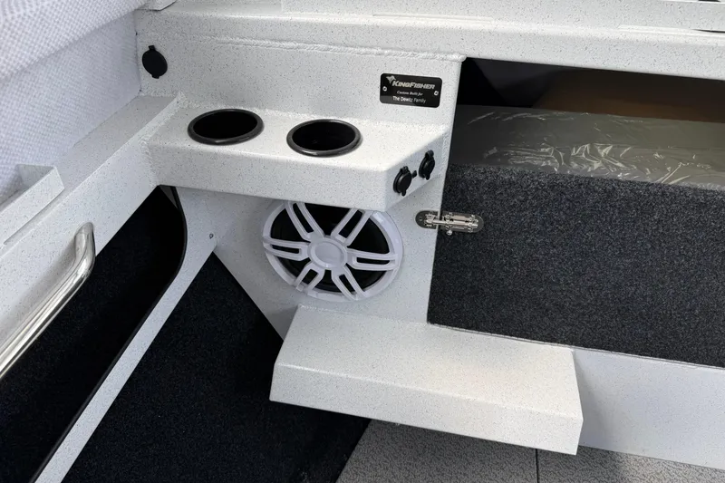 Slide: The Image of Interior of 2026 KingFisher 2825 Coastal Express boat with cup holders and speaker. - 22