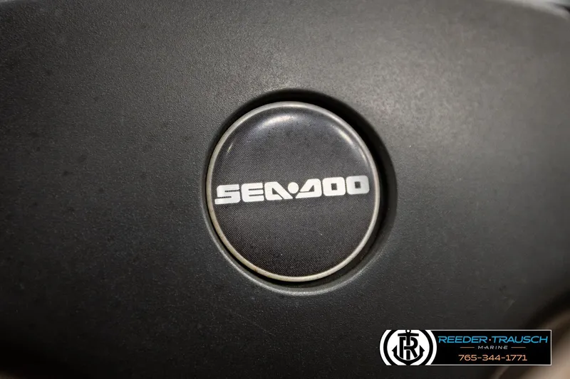 Slide: The Image of 2007 Sea Doo 150 Speedster logo on black surface, Reeder-Trausch Marine branding. - 21