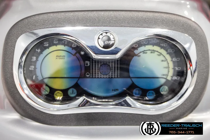 Slide: The Image of Dashboard of a 2007 Sea Doo 150 Speedster with RPM and speed gauges. - 24