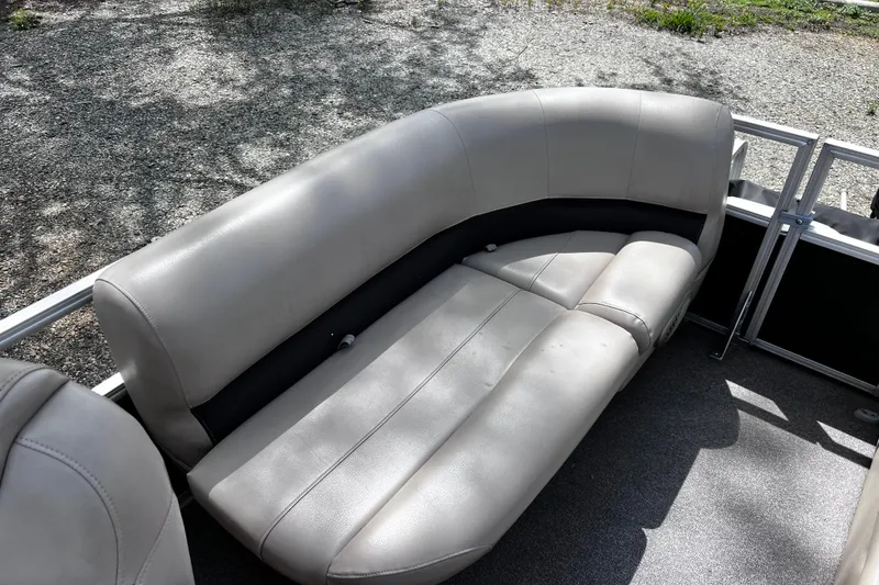 Slide: The Image of 2017 Sun Tracker Party Barge 22 DLX pontoon boat seating area. - 14