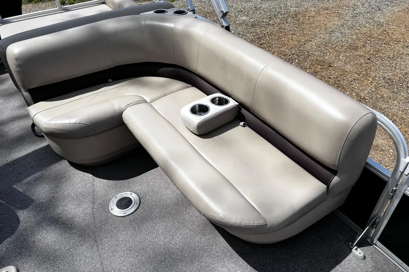 Slide: The Image of 2017 Sun Tracker Party Barge 22 DLX pontoon boat seating with cup holders. - 16