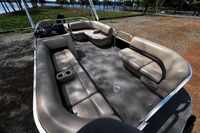 Slide: The Image of 2017 Sun Tracker Party Barge 22 DLX pontoon boat with spacious seating and cup holders. - 19