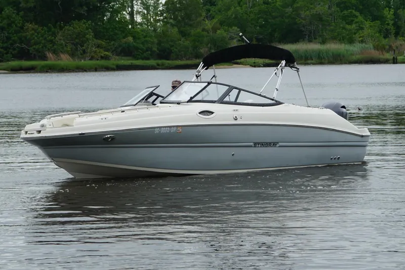 Slide: The Image of Yamaha tachometer displaying 44.8 hours on a 2021 Stingray 231 DC boat. - 23