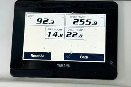Slide: The Image of Yamaha display showing fuel usage, trip distance, and hours for 2023 Sea Hunt Ultra 239 SE. - 8
