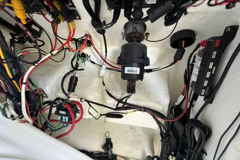 Slide: The Image of Wiring and components inside a 2023 Sea Hunt Ultra 239 SE boat. - 17