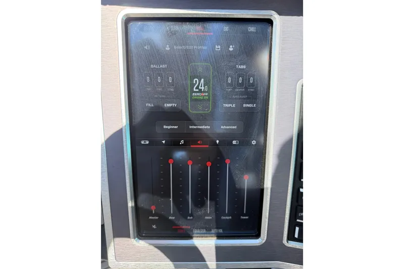 Slide: The Image of 2023 MasterCraft XT24 touchscreen control panel displaying ballast and audio settings. - 15
