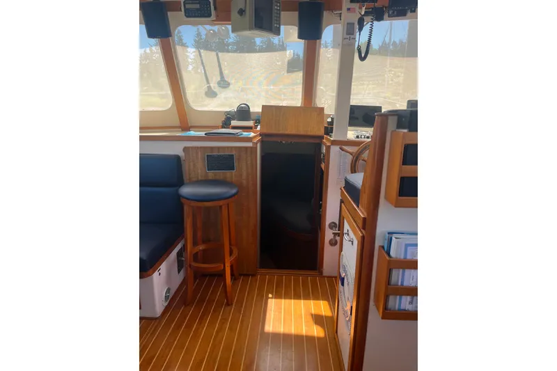 Slide: The Image of 1972 DeFever 38 Passagemaker interior with wooden flooring and seating. - 11