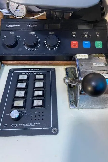 Slide: The Image of Control panel of a 1972 DeFever 38 Passagemaker with navigation and alert systems. - 30