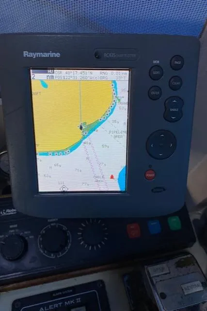 Slide: The Image of Raymarine GPS display on 1972 DeFever 38 Passagemaker boat, showing navigational chart. - 32