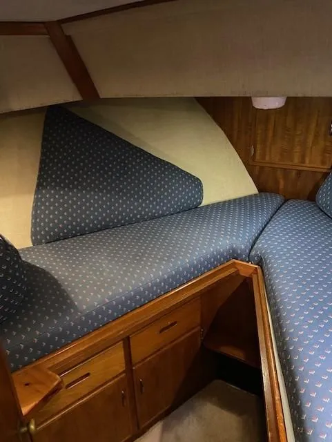 Slide: The Image of Interior cabin of 1972 DeFever 38 Passagemaker with blue patterned upholstery. - 39
