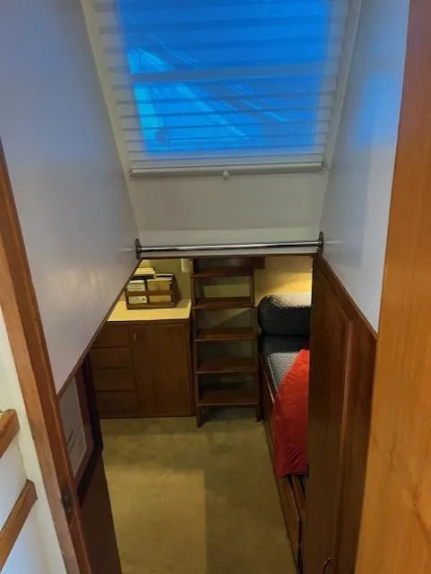 Slide: The Image of Interior cabin of 1972 DeFever 38 Passagemaker with wooden furnishings and cozy bedding. - 50