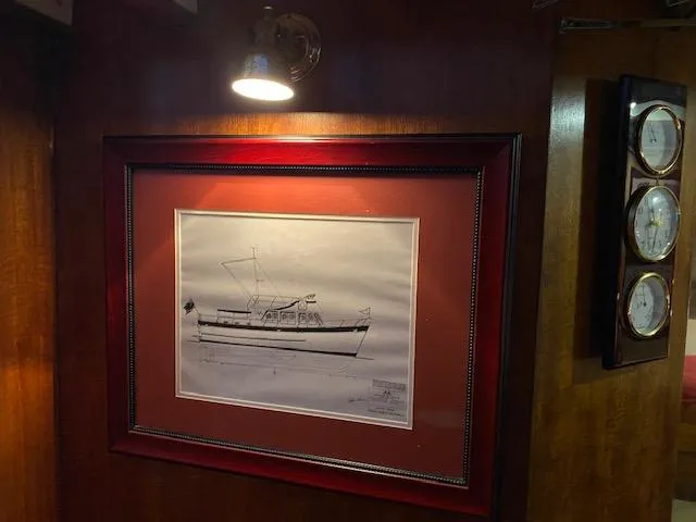 Slide: The Image of Framed sketch of 1972 DeFever 38 Passagemaker yacht, illuminated by wall light. - 60