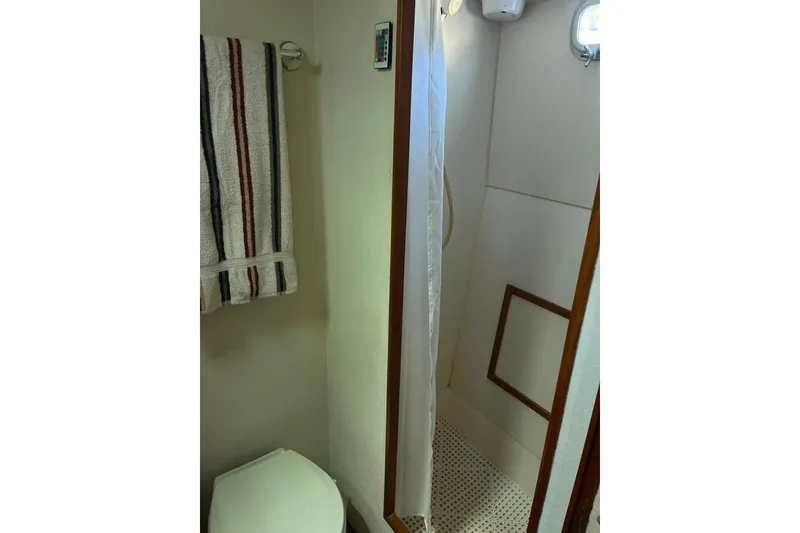 Slide: The Image of Bathroom interior of 1972 DeFever 38 Passagemaker with shower and towel rack. - 65