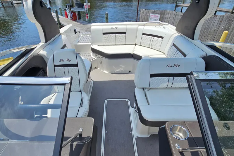 Slide: The Image of Luxurious interior of a 2018 Sea Ray SLX 230 boat with elegant seating and modern design. - 30