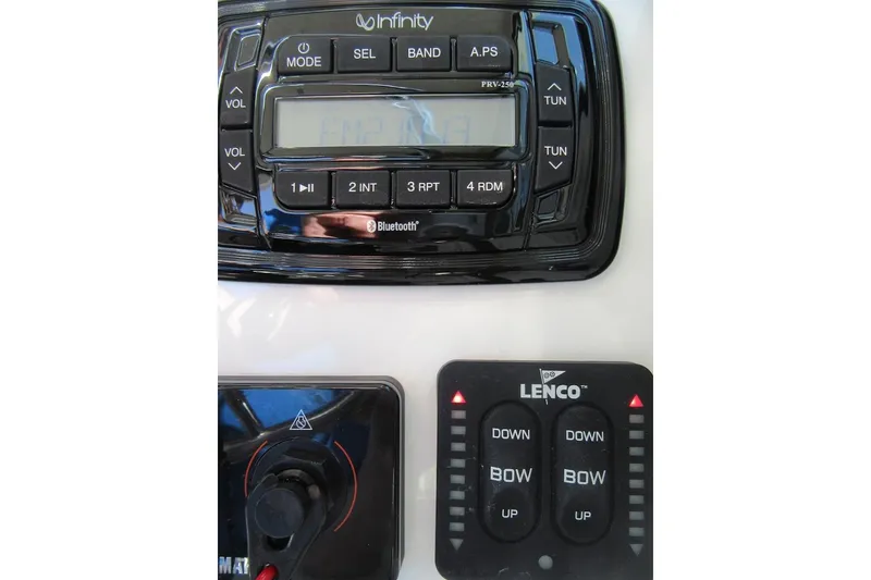 Slide: The Image of Control panel of a 2013 Parker 2320 SL Sport Cabin with Infinity and Lenco systems. - 37