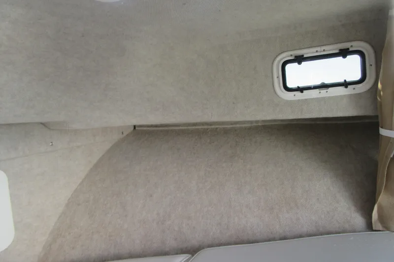 Slide: The Image of Interior cabin view of a 2013 Parker 2320 SL Sport Cabin boat. - 45