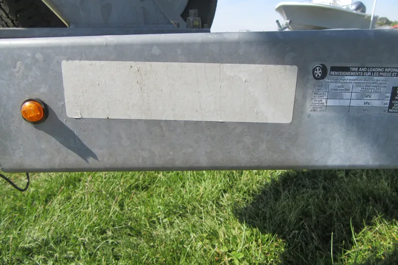 Slide: The Image of Trailer hitch with tire and loading information, Parker 2320 SL Sport Cabin, 2013 model. - 6