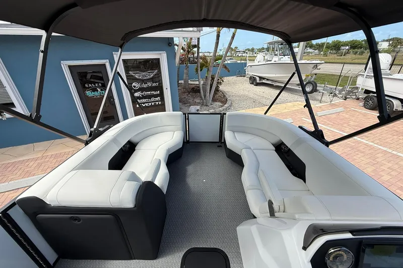 Slide: The Image of Interior of 2026 Evotti 523CS boat with spacious seating and modern design. - 15