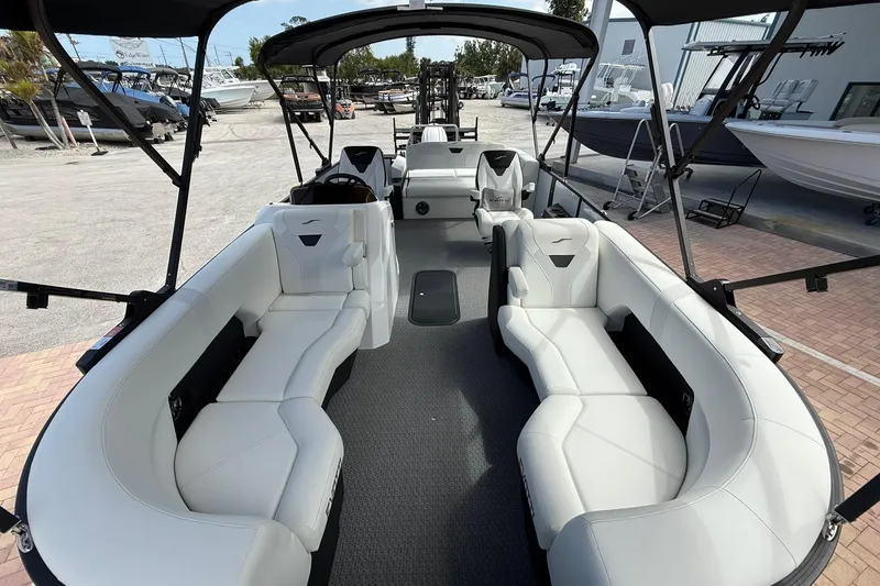 Slide: The Image of Luxurious interior of 2026 Evotti 523CS boat with white seating and modern design. - 16