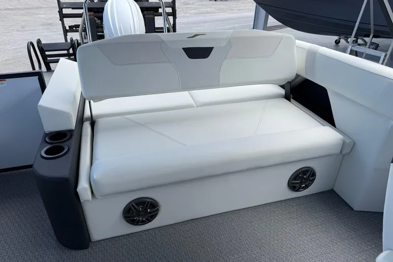 Slide: The Image of Luxurious seating on 2026 Evotti 523CS boat, featuring white upholstery and integrated speakers. - 20