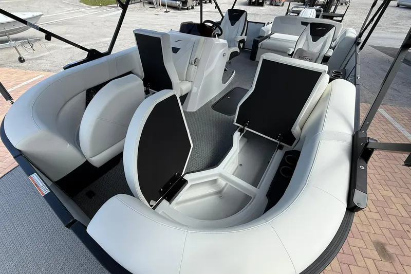 Slide: The Image of Luxurious 2026 Evotti 523CS boat interior with plush seating and storage compartments. - 22