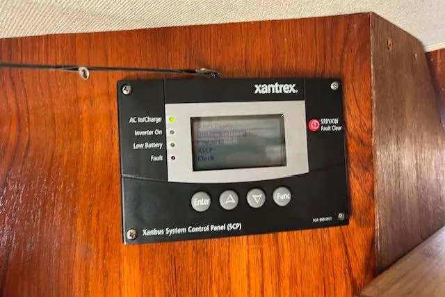 Slide: The Image of Xantrex control panel on 1985 Egg Harbor 33 Convertible boat interior. - 21