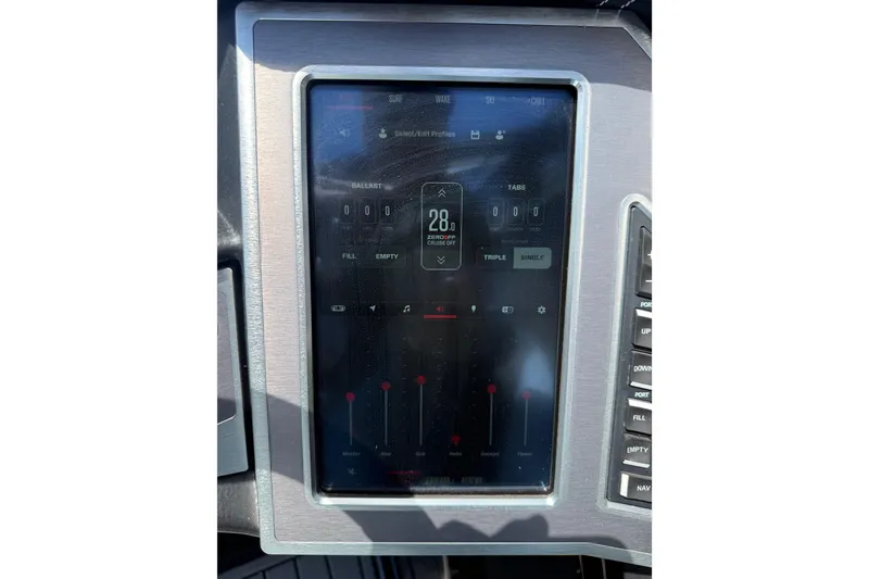 Slide: The Image of Dashboard display of a 2022 MasterCraft XT24 boat showing ballast and speed settings. - 12