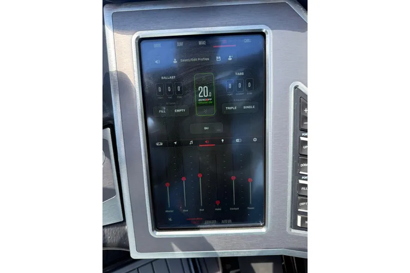 Slide: The Image of Touchscreen control panel of a 2022 MasterCraft XT24 boat displaying ballast and tab settings. - 13
