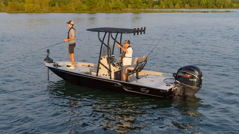 Slide: The Image of Two people fishing on a G3 Bay 19 GX boat, 2026 model. - 15