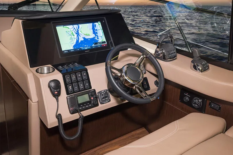 Slide: The Image of Luxurious interior of 2019 Regal 42 Grande Coupe with plush seating and elegant table. - 20