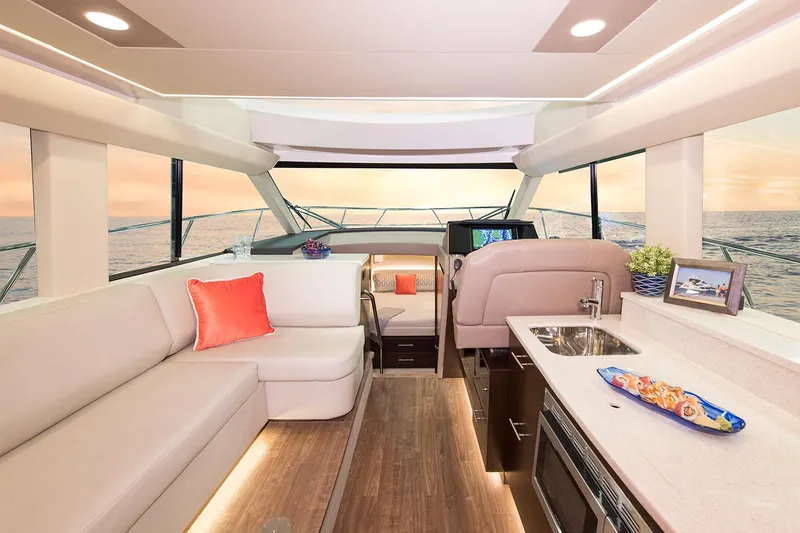 Slide: The Image of Manufacturer Provided Image: Interior of 2019 Regal 42 Grande Coupe yacht with modern furnishings and ocean view. - 52