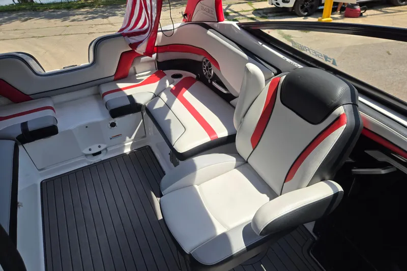 Slide: The Image of 2018 Yamaha Boats 242X interior with red and white seating, showcasing modern design. - 3