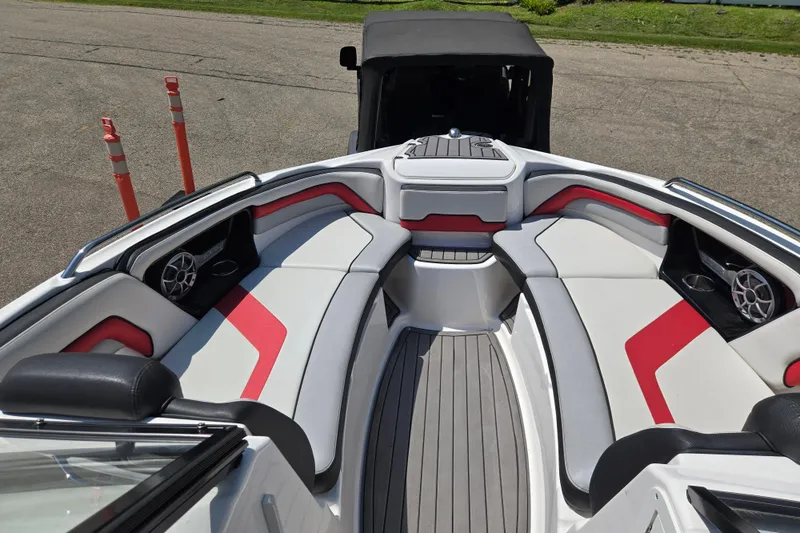 Slide: The Image of 2018 Yamaha Boats 242X interior with sleek seating and modern design. - 6