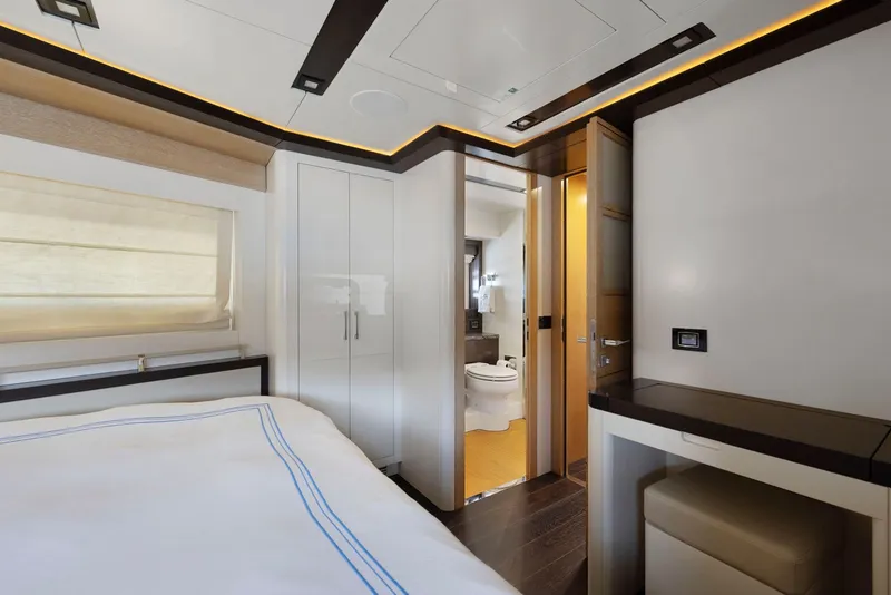 Slide: The Image of Interior of Sirena 64 yacht, bedroom with ensuite bathroom, 2020 model. - 41