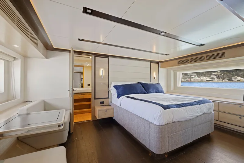 Slide: The Image of Luxurious bedroom on the Sirena 64 yacht, model year 2020. - 45