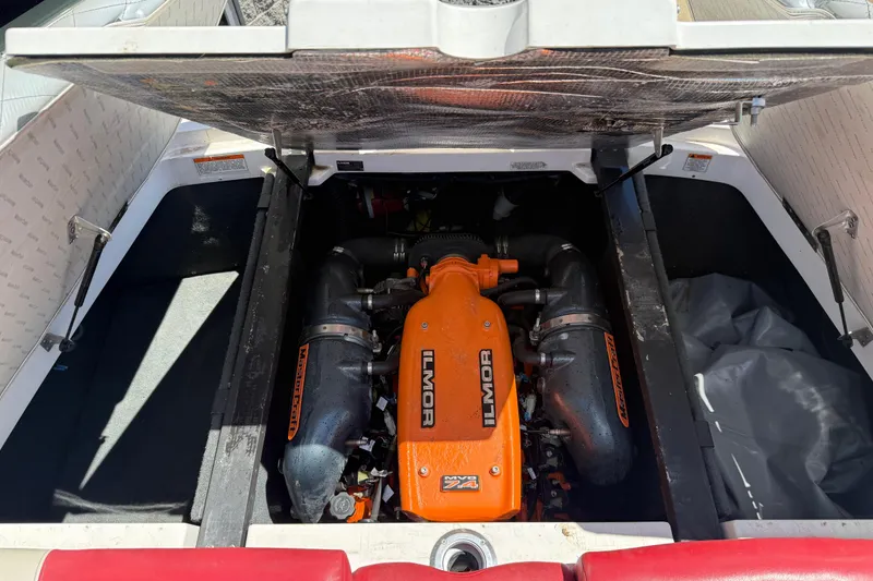 Slide: The Image of 2013 MasterCraft X-45 boat engine compartment with Ilmor engine visible. - 18