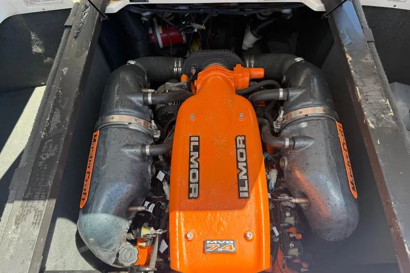 Slide: The Image of 2013 MasterCraft X-45 Ilmor MV8 7.4 engine, detailed view with orange accents. - 19