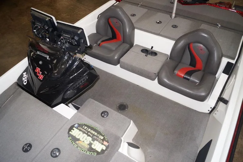 Slide: The Image of 2018 Bass Cat Pantera II boat interior with dual seats and advanced navigation system. - 10