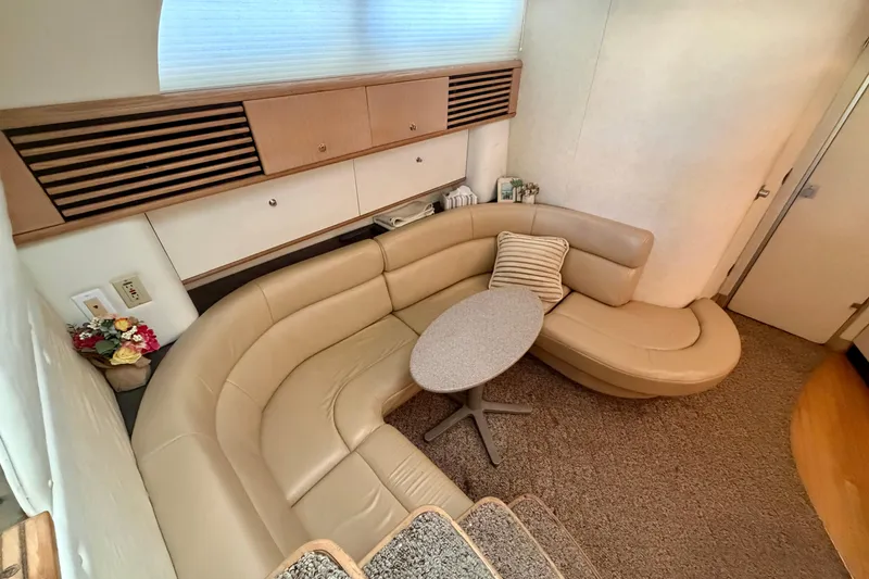 Slide: The Image of Luxurious interior of 1997 Avanti 4085 Sunbridge with beige leather seating and modern decor. - 11